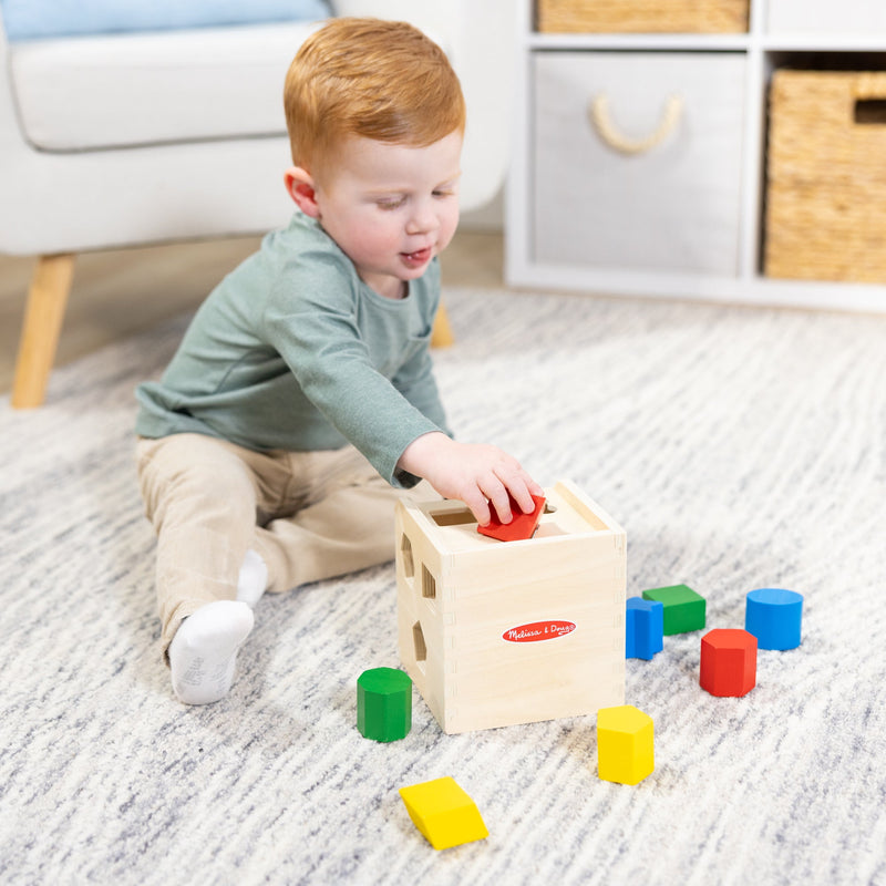 Melissa & Doug - Shape Sorting Cube - in use during play