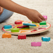 Melissa & Doug - Shape Sorting Clock - in use during play
