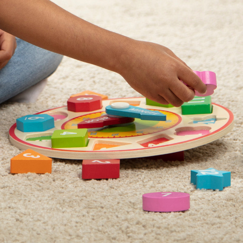 Melissa & Doug - Shape Sorting Clock - in use during play