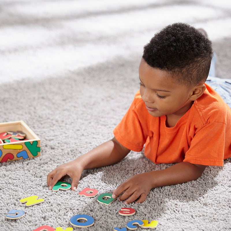 Melissa & Doug - Wooden Letter Alphabet Magnets - in use during play