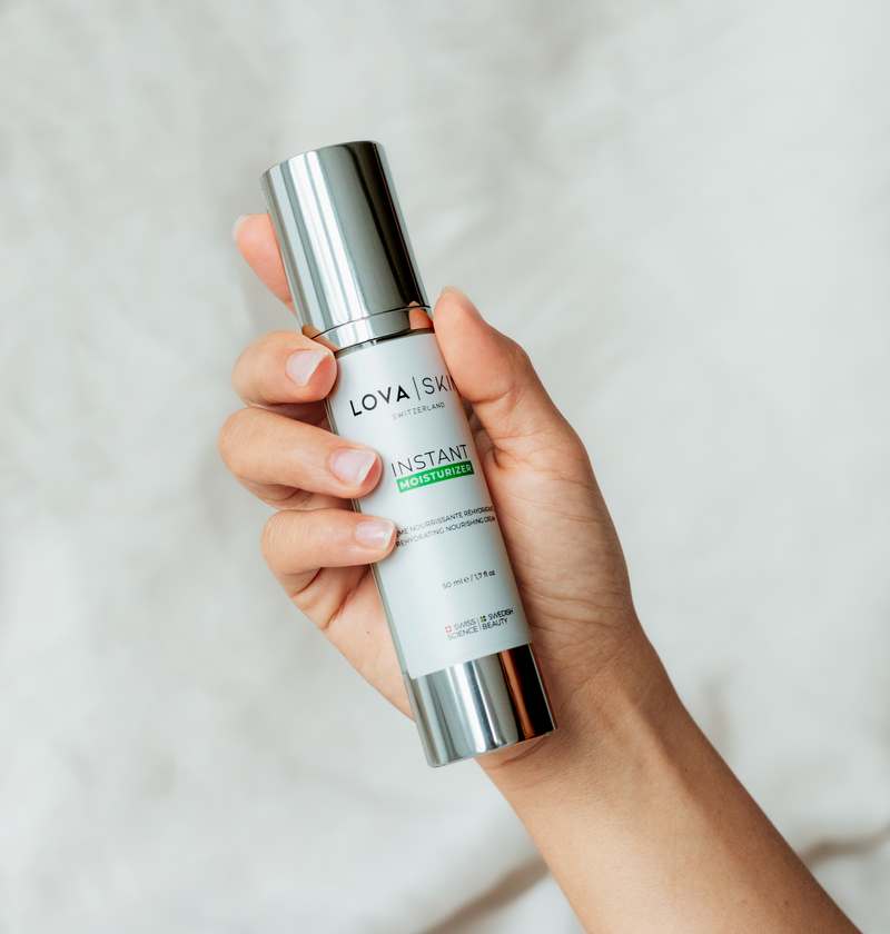 LOVASKIN Instant Moisturizer 50 mL – bottle held in hand
