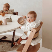 Meyco Baby Sleeved Baby Bib – Branches Sand – additional product detail or lifestyle view