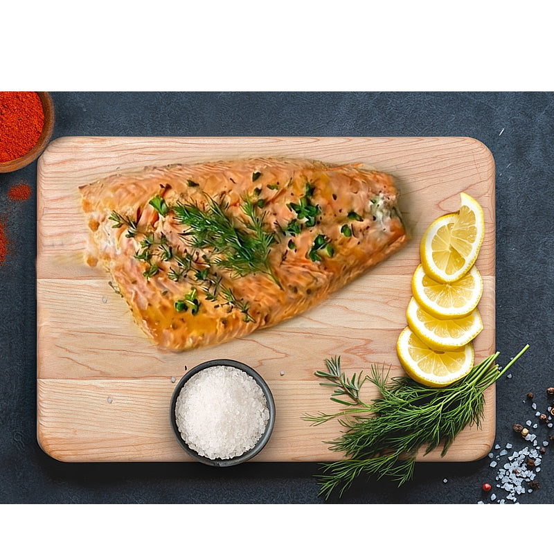 Natural Living - Maple Cutting Board — 36 x 26 cm maple cutting board used for food preparation.