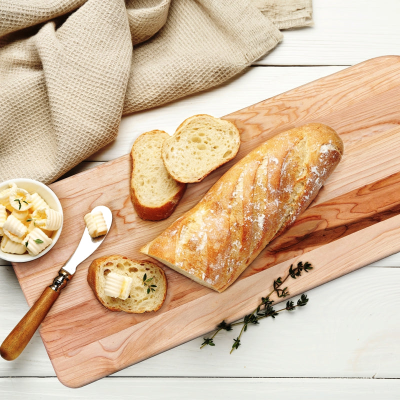 Natural Living - Maple Cutting Board — 50 x 26 cm maple cutting board used for bread serving.