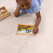 Melissa & Doug - 12-Piece Wooden Puzzles - Construction Vehicles (Set of 4) - in use during play