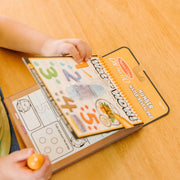 Melissa & Doug - Water WOW! - Numbers Water-Reveal Pad - in use during play