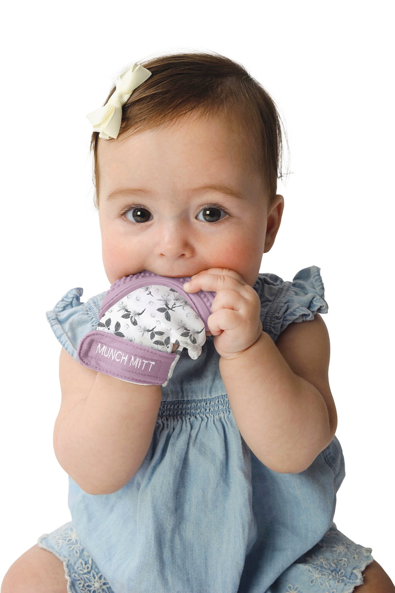 Malarkey Kids Munch Mitt Wearable Teether – Lilac Bloom – baby wearing lilac floral teething mitt