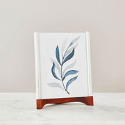 Nambé Sky View Photo Frame in a display setting; other items shown are sold separately.