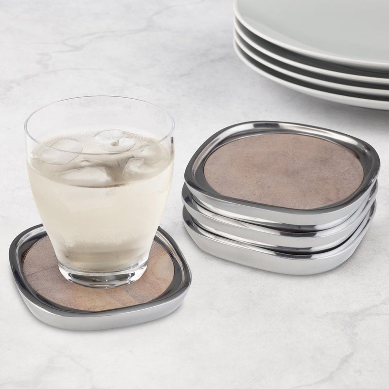 Nambé Sandstone Coasters (Set of 4) in a display setting; other items shown are sold separately.