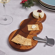 Nambé Snowman Cheese Board with Top Hat Spreader in a display setting; other items shown are sold separately.