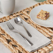Nambé Aura 45-Piece Flatware Set in a display setting; other items shown are sold separately.