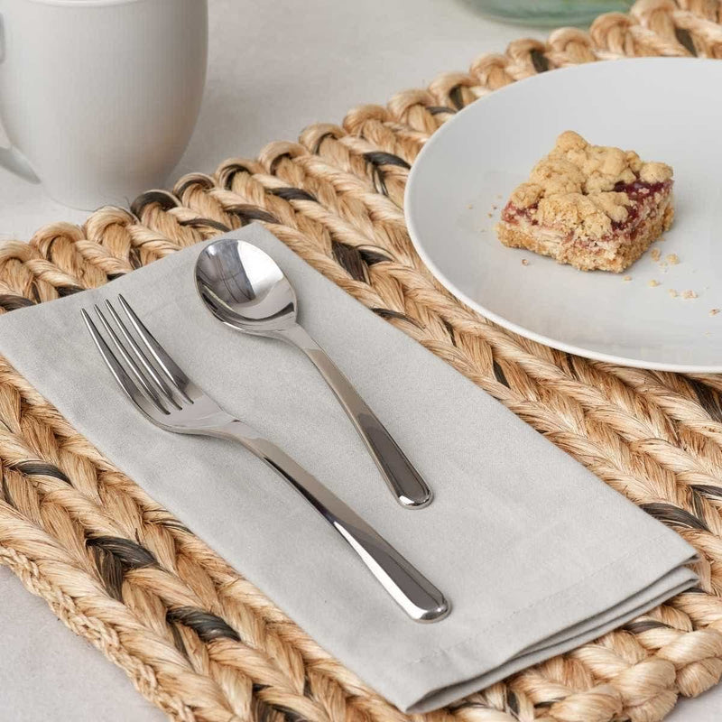 Nambé Aura 45-Piece Flatware Set in a display setting; other items shown are sold separately.