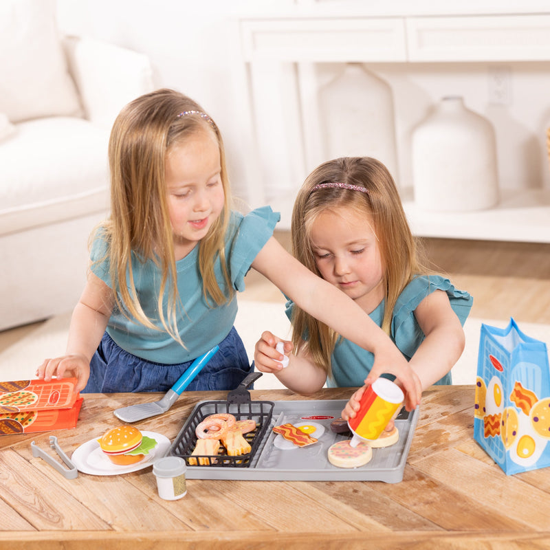 Melissa & Doug - Flip & Fry Grill Play Set with Water WOW! - in use during play