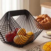 Natural Living - Angular Metal Fruit Basket - Black — fruit basket in a kitchen setting.