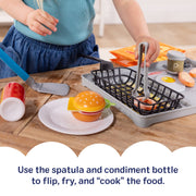 Melissa & Doug - Flip & Fry Grill Play Set with Water WOW! - in use during play