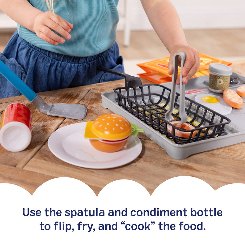 Melissa & Doug - Flip & Fry Grill Play Set with Water WOW! - in use during play