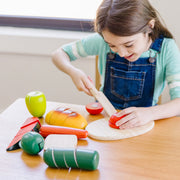 Melissa & Doug - Cutting Food - Wooden Play Food - in use during play