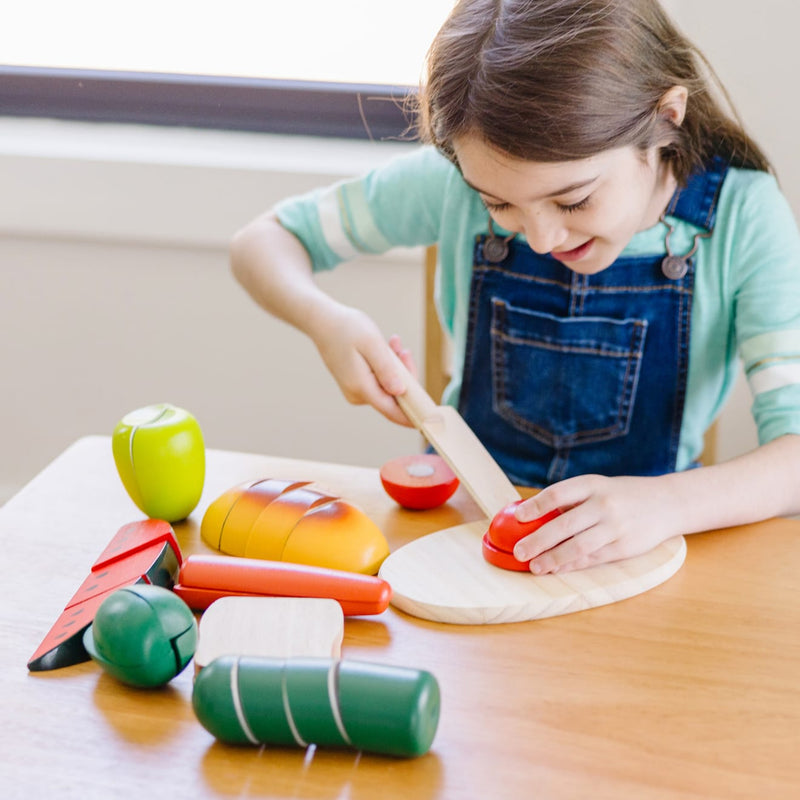 Melissa & Doug - Cutting Food - Wooden Play Food - in use during play