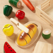 Melissa & Doug - Cutting Food - Wooden Play Food - in use during play