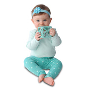 Malarkey Kids Chew Cube Teething Rattle – Mint Green – baby holding mint green cube