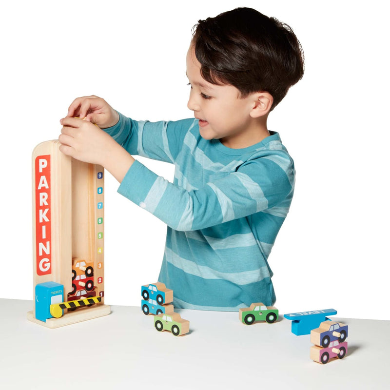 Melissa & Doug - Wooden Stack & Count Parking Garage - in use during play