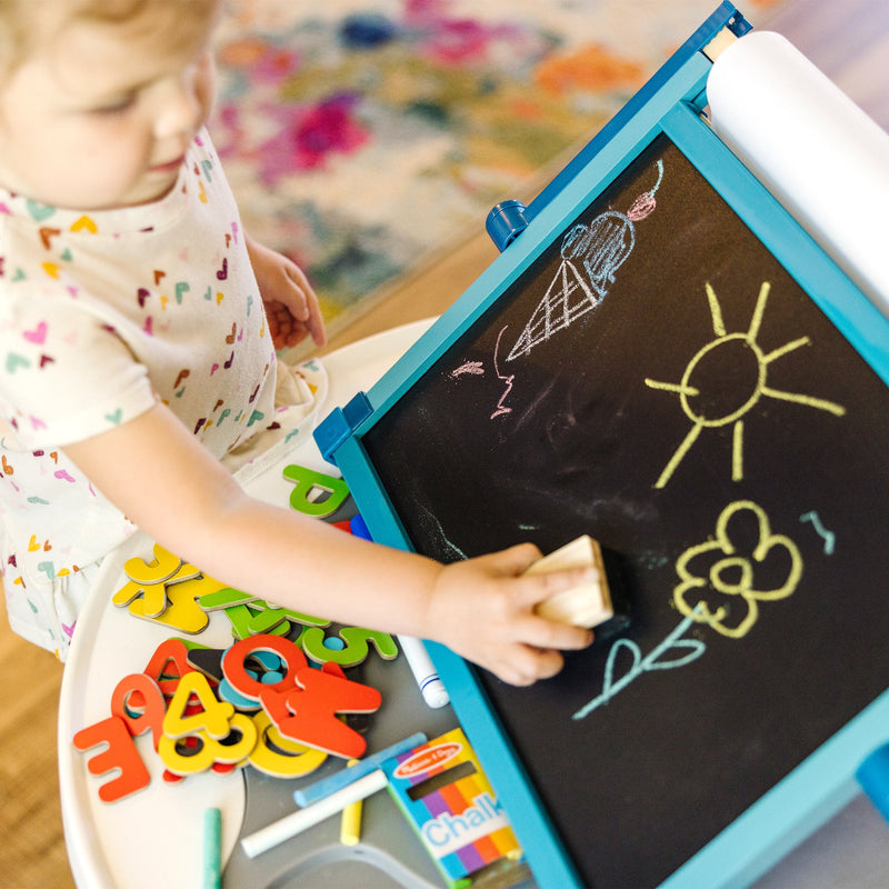 Melissa & Doug - Double-Sided Magnetic Tabletop Easel - in use during play