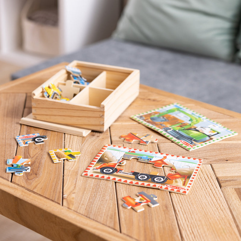 Melissa & Doug - 12-Piece Wooden Puzzles - Construction Vehicles (Set of 4) - in use during play