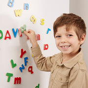 Melissa & Doug - Wooden Letter Alphabet Magnets - in use during play
