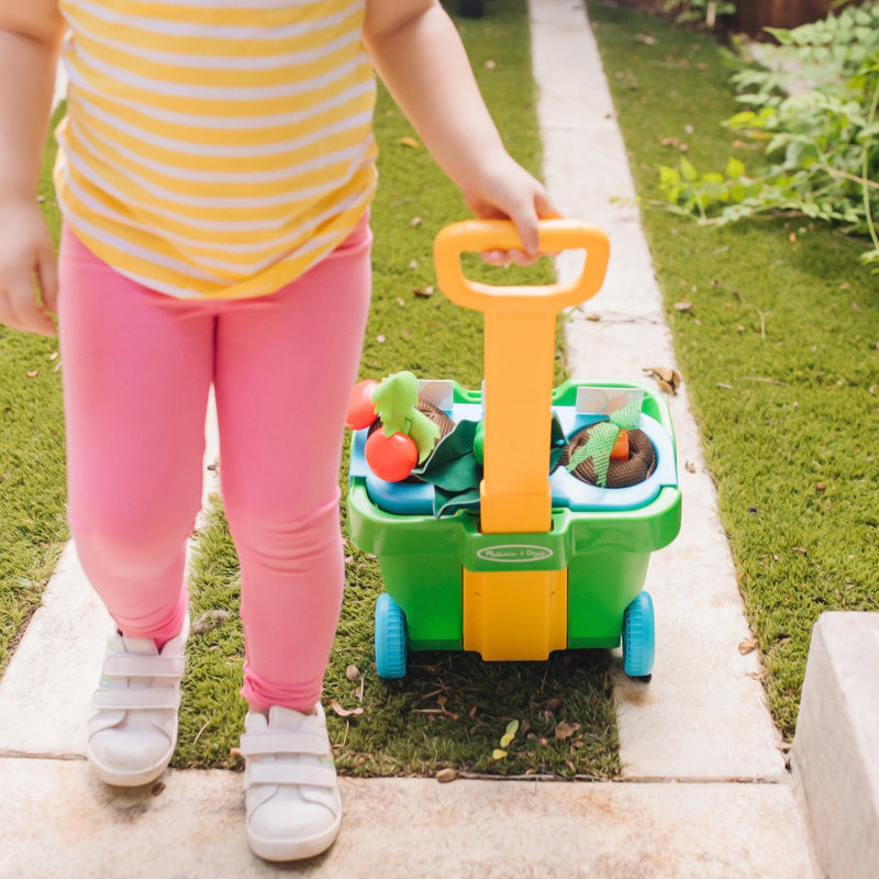 Melissa & Doug - Vegetable Gardening Play Set - in use during play