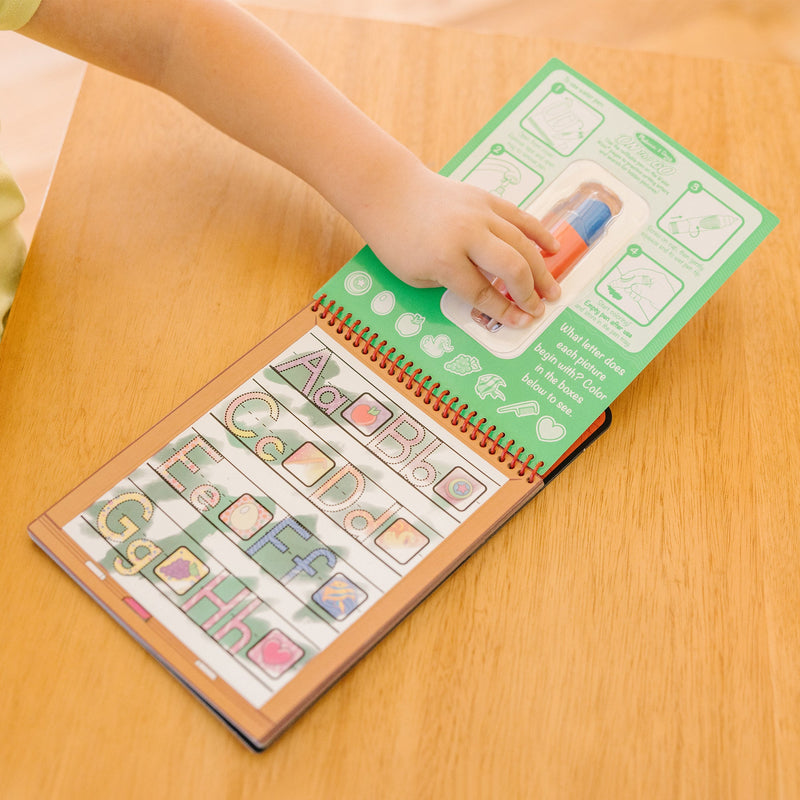 Melissa & Doug - Water WOW! - Alphabet Water-Reveal Pad - in use during play