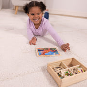 Melissa & Doug - 12-Piece Wooden Puzzles - Dinosaurs (Set of 4) - in use during play