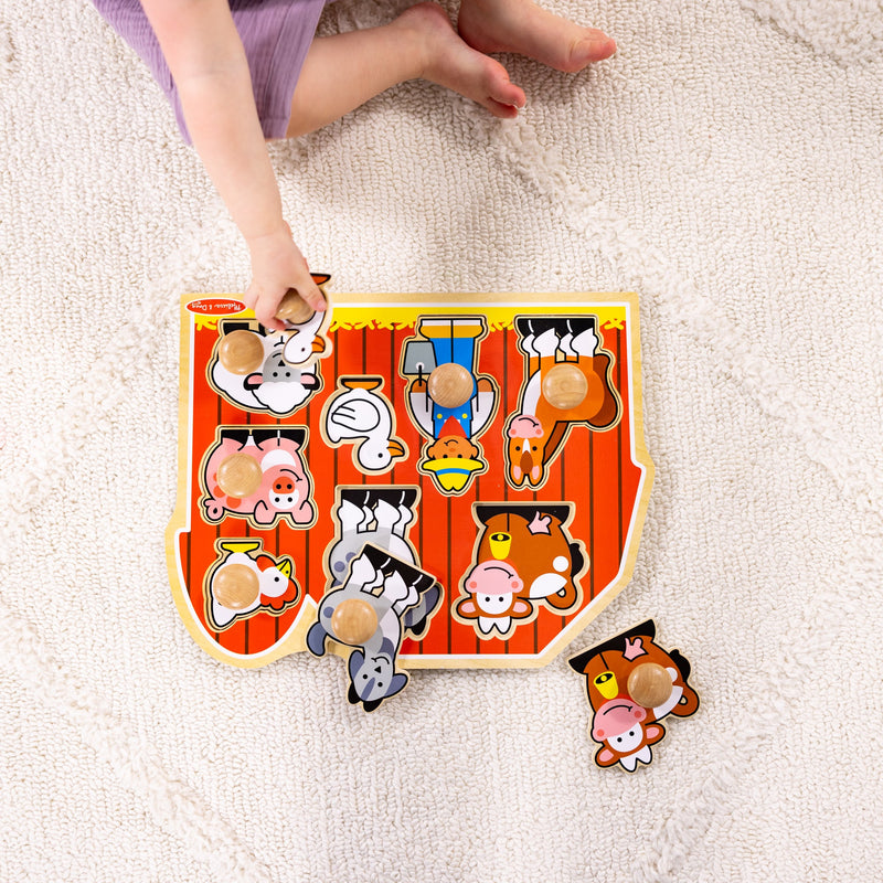 Melissa & Doug - 8-Piece Wooden Peg Puzzle - Farm Friends - in use during play