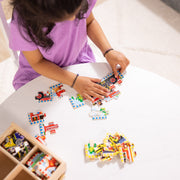 Melissa & Doug - 12-Piece Wooden Puzzles - Vehicles (Set of 4) - in use during play