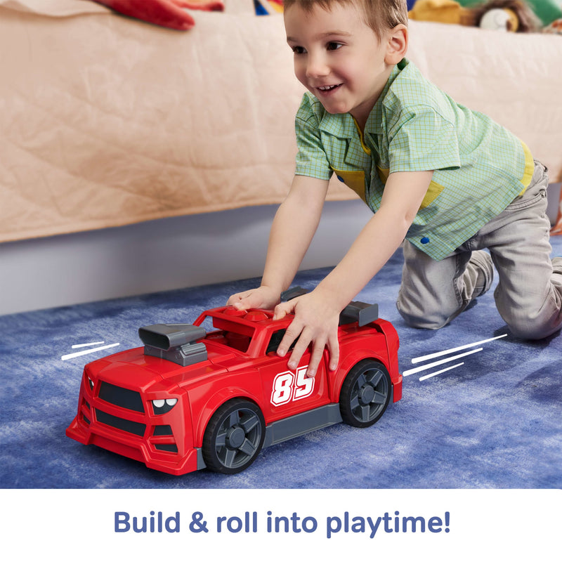 MEGA BLOKS Build & Go Race Car 26-Piece Set (JKG35) — child playing with race car