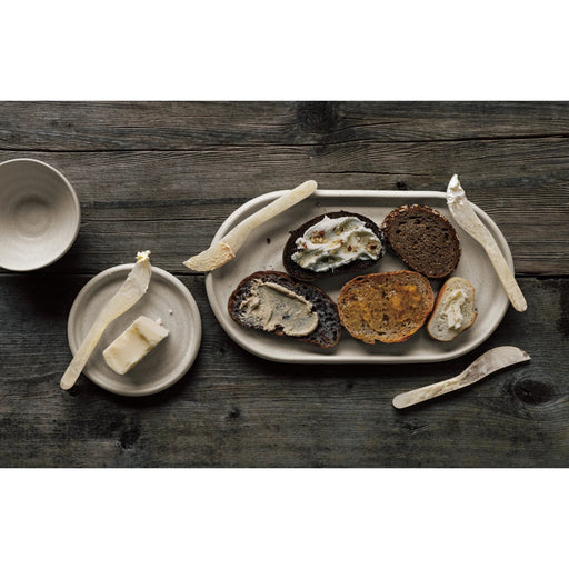 Heirloom - Ivory Resin Spreader Set of 4 Home & Kitchen