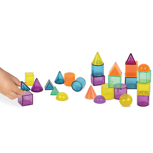 Hands assembling translucent geometric shapes from GeoShape Challenge