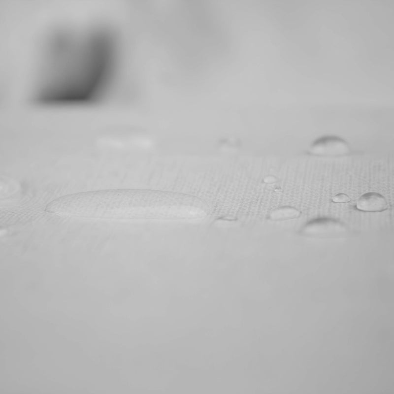 Loytel white waterproof fitted cover on an aesthetic treatment table