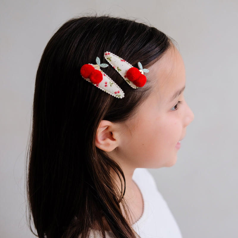 Mimi & Lula Pom Pom Cherries Clic Clacs Hair Clips (2-Pack) - detail or styling view; other accessories shown are not included