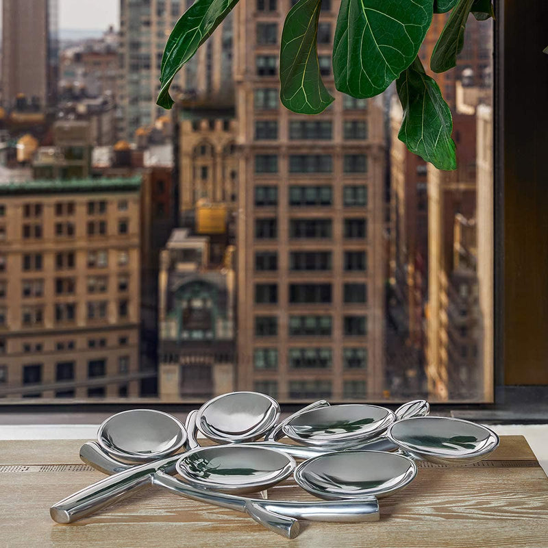 Nambé Tree of Life Seder Plate in a display setting; other items shown are sold separately.