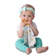 Malarkey Kids Munch-It Blanket Teether – Sweet & Salty – baby using pretzel blanket teether