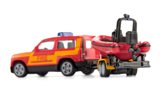 Siku - LAND ROVER DEFENDER WITH BOAT Games & Toys