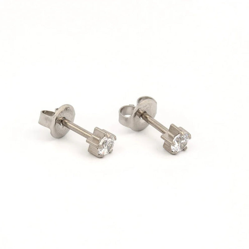 Studex - L100W Cubic Zirconia Tiffany Ear Rings Steel 4mm (pair) Beauty & Personal Care